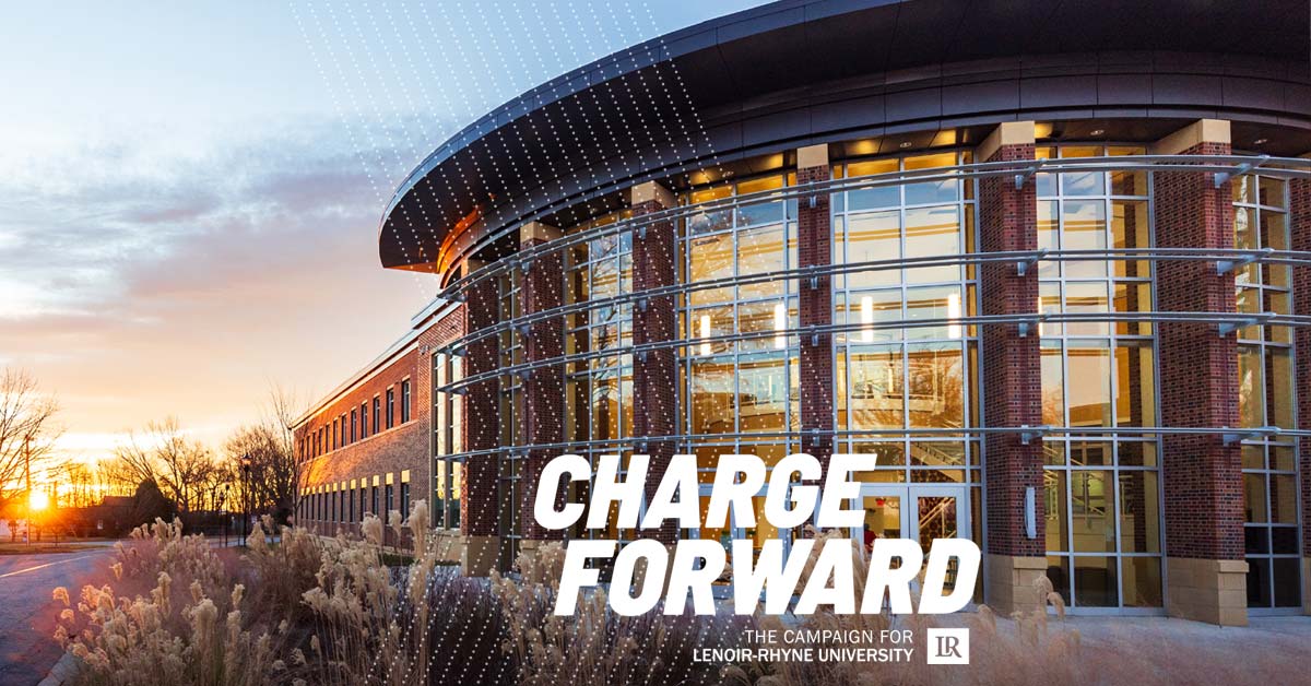 George hall at sunset with Charge Forward logo